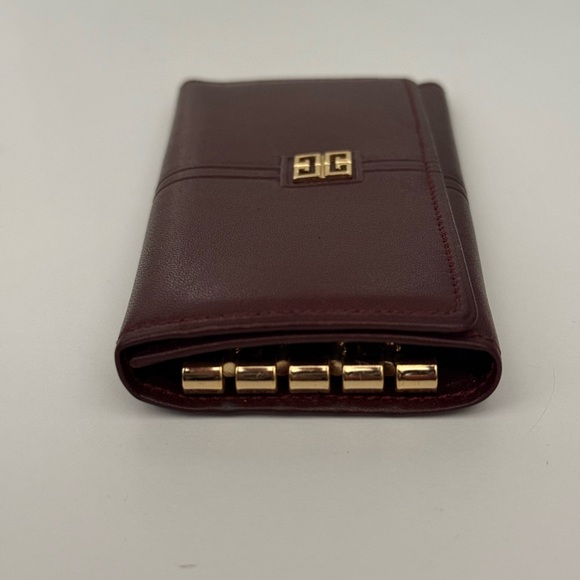 Givenchy 4 Key Holder. Color is of dark red  / brown - Picture 2 of 6